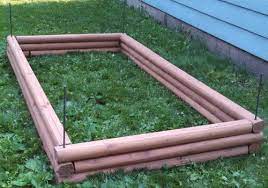 We didn't have space for both a garden bed and a compost heap so we chose to use the keyhole garden bed method to create a. Diy Raised Garden Bed With Landscaping Timbers