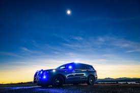 Sometimes the “office” is the great outdoors. Here, Detective Trooper  Christopher Sweeney, a member of CSST is using ground probes to disturb the  earth so that Human Remains Detection Dogs could search