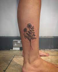Feverfew And Fern Tattoo Inked On The Right Calf By Kirk Budden Fern Tattoo Tattoos Beautiful Flower Tattoos