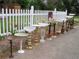 You can stand your bird bath on an old candlestick or table leg, or sit it on top of a larger overturned plant pot. Remodelaholic 12 Fun And Easy Diy Birdbath Ideas