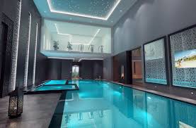 With both indoor and outdoor pools available we have something for all seasons. Design By Uber Inspirational Interior Design Indoor Swimming Pool Design Indoor Pool Design Luxury Swimming Pools