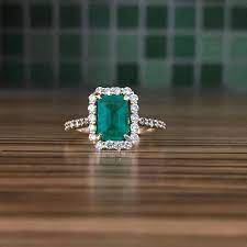 Emerald And Diamond Yellow Gold Ring Emerald Engagement Ring Etsy In 2021 Emerald Engagement Ring Emerald Engagement Ring Green Emerald Diamond Engagement Ring Halo