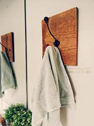 Sand each piece of wood to remove any rough edges and stain in the color of your choice. Diy Towel Racks For A Chic Bathroom Update