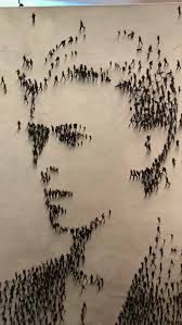 Californian artist Craig Alan creates unique and amazing portraits by  painting tiny figures to use as pixels