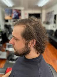 D' Martins Barber Shop‎