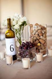 Set the table with printed paper napkins and disposable plates that feature wine bottle. 47 Adorable Vineyard Wedding Centerpieces Weddingomania