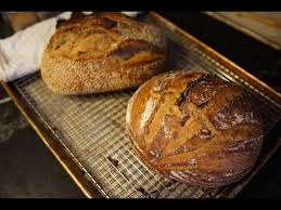 First set of stretches and folds. Loading Bread Into Dutch Oven And Clay Baker Youtube