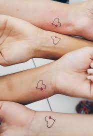 Hearts Flowers Wrist Tattoos Four Hands Matching Tattoos Friend Tattoos Small Matching Best Friend Tattoos Small Heart Tattoos
