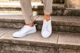 One benefit of wearing a blue men's wedding suit is that it will complement virtually every color you pair it with—even black gets a punch from the blues. How To Wear Sneakers With Suits Aquila