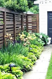 Top 60 Best Front Yard Fence Ideas Outdoor Barrier Designs In 2020 Privacy Landscaping Large Backyard Landscaping Privacy Fence Landscaping