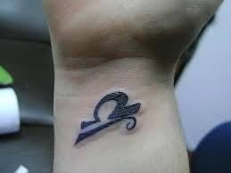 Libra symbol using tribal style would create an imaginative and ornamental look for a tattoo. 20 Mind Blowing Libra Wrist Tattoos