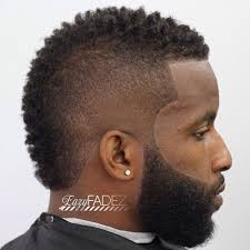 The surface twist faux hawk with the beard is one of the amazing mohawk hairstyles for black men. Pin On Male Natural Hair