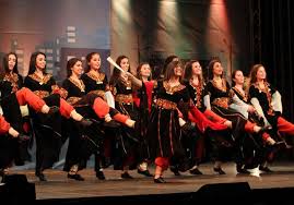 To make dance, to dandle. Dabke Wikipedia