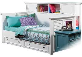 I Love The Daybed Trundles For A Kids Room Or Guest Room This Belmar White Bookcase Daybed From Rooms T Bedroom Furniture Stores Daybed Bedroom Bedroom Sets