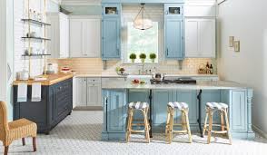 Beautiful kitchen with white cabinets, dark kitchen island. Blue Kitchen Cabinets A Trending Design Wellborn Cabinet Blog
