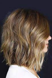 Apart from medium length layered bob, there's one more cut that can breathe a new life into your curls! Shaggy Bob Haircut Medium Length Novocom Top
