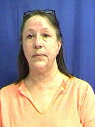 Iowa woman accused in ex-boyfriend's 1992 killing to be tried again