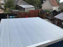 Next, the installation of the waterproofing is carried out. Should I Convert My Flat Garage Roof To A Pitched One In 2020 Garage Roof Roof Corrugated Roofing