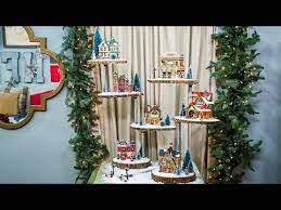 With a bit of digging about the garage my husband located enough treated scrap wood to put together a simple triangular tree shaped unit. Diy Christmas Village Stand Home Family Youtube