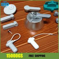 How can i get security tag off clothing? Eas System Clothing Security Hard Tag Remover 15000gs Detacher Silver Color 1pcs Free Shipping Security Locks Security Alarm Tag Remover