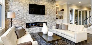 An undulating stone wall creates a barrier while looking stylish at the same time. Choosing The Perfect Location For Your Stone Accent Wall Erth Coverings