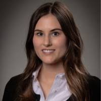 Michaela Baldwin, AINS