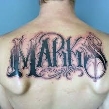 Your family name in ink on your body shows respect to you father, grandfather for tattoo ideas lets design a pattern on the upper back. 50 Last Name Tattoos For Men Honorable Ink Ideas Family Tattoos For Men Last Name Tattoos Tattoos For Guys