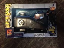 The vehicle is extremely high, being as tall as a story of a building, and the cockpit is on the top of the car. Gru S Car From Despicable Me Minion Dm2 1815742549