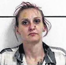 Five charged after home search