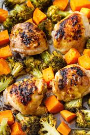 Sheet Pan Chicken Thighs With Sweet Potato And Broccoli Recipe Pan Chicken Thighs Sheet Pan Dinners Chicken Baked Chicken Thighs