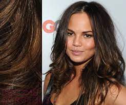 The highlights are used to enhance her curls. 26 Hair Color Idea For Tan Skin Hair Hair Styles Long Hair Styles