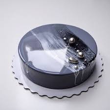 Black And White Mirror Glaze Cake Black Grey White Mirror Glaze On One Tier Cake How To Make Mirror Glaze Placed On White Tray White Background In 2020 Mirror Glaze Cake Mirror Glaze Mirror Cake