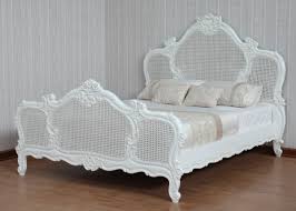 Maybe you would like to learn more about one of these? French Arch White Rattan Bed