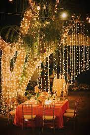 12 Inspiring Backyard Lighting Ideas The Garden Glove Outdoor Fall Wedding Wedding Lights Backyard Wedding