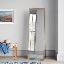 Hanging a group of mirrors on a wall is an easy way to add character to a space. Mistana Abilene Standing Hanging Or Leaning Against Wall Full Length Mirror Reviews Wayfair