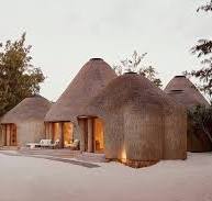 kisawa' resort weaves undulating thatched-roof villas into ...
