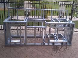 an outdoor kitchen with metal studs