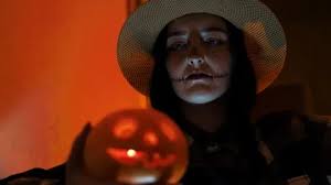 Mystic scary halloween image with pumpkin jack in dark room