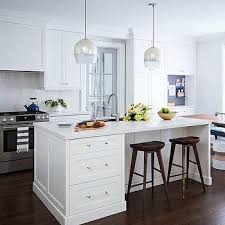 white and silver island pendant lights