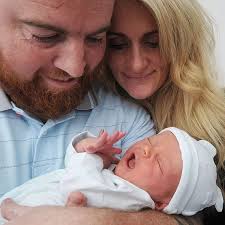 There's a little Christmas miracle for the parents who lost their  'superhero' boy to cancer in January... and he's beautiful