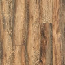 This flooring will set you back between $4.00 and $5.00 per square foot, which is at the mid to low end of the market, which has average prices of $3.00 to. Pergo Portfolio Harvest Pine 7 48 In W Embossed Wood Plank Laminate Flooring Lowes Com Flooring Natural Wood Flooring Pergo