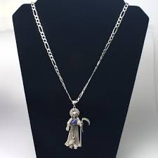 Maybe you would like to learn more about one of these? Silver 51 7g La Santa Muerte Pendant On Figaro Chain Necklace Property Room