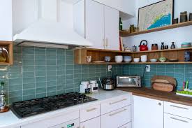 Green and brown are very earthy colors that bring a style and theme to this kitchen and laundry room area. Green Kitchen Backsplash Ideas And Inspiration Hunker