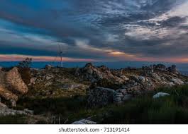 You'll cross the river on old industrial bridge and pass below wooded mountainsides coated with chestnut trees, cork oaks as well as orchards and vineyards. Windmill Caramulo Mountain Tondela Portugal Stock Photo Edit Now 713191414