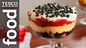Add the ingredients to the trifle dish in layers in this order: How To Make Trifle With Red White And Blue Layers Tesco Food Youtube