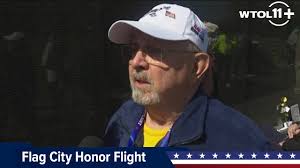 'I feel the heaviness': Veterans travel to Washington, D.C. for Flag City  Honor Flight