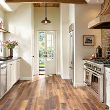 Even if this is a permanent floor (as in #2) you are welcome to run the floors up to the cabinets if you so desire. Should You Install Hardwood In Your Kitchen Second Street Floors