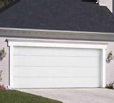 A sectional garage door opens vertically like a standard door, but without kicking out like an up and over door. Wood Garage Doors Omaha Door Window