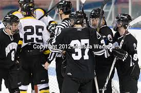 The Polar Bears celebrate Michael Lozzi's (Bowdoin
