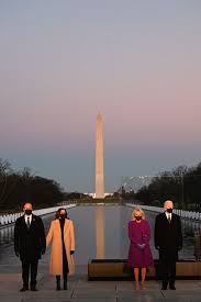 From a symbolic blue coat worn by jill biden to poet amanda gorman's striking yellow prada coat, inauguration day was filled with. At Today S Covid Memorial Kamala Harris And Jill Biden S Outfit Choices Augur Change Vogue